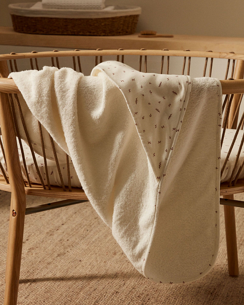 Deya baby towel cape in white cotton with patterns